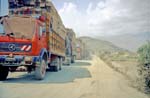 280_long.file.of.lorries.carrying.cedar.beams,.waiting.to.depart.as.a.convoy.for.markets.in.pakistan.and.dubai