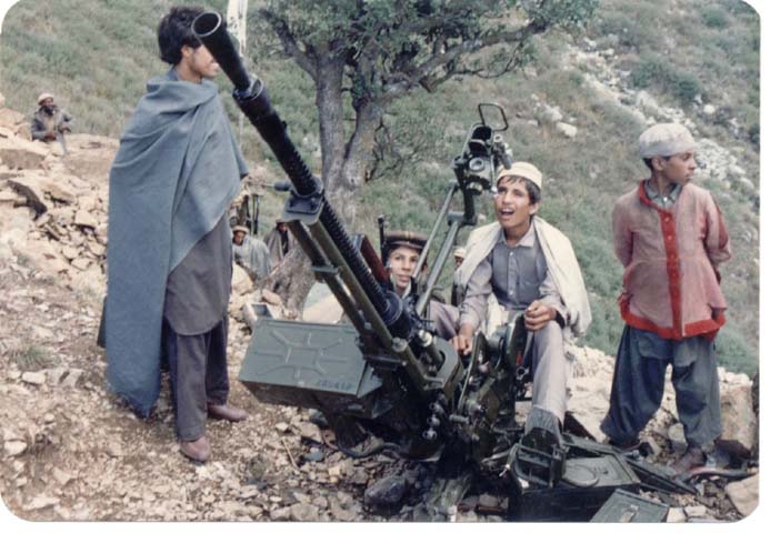 Kids with 'zikuyak' Soviet-designed/Chinese-made 14.5-mm anti-aircraft gun