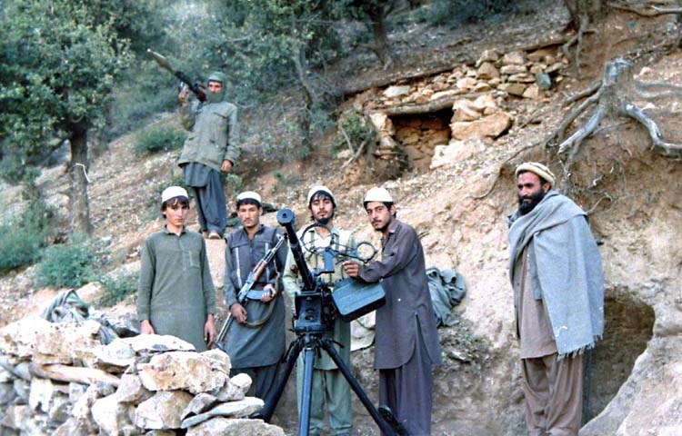 Jamiat-e islami group shelter and 'Dashaka' .50 cal machine gun position in Shultan valley. Afghanistan, Kunar, october 1987