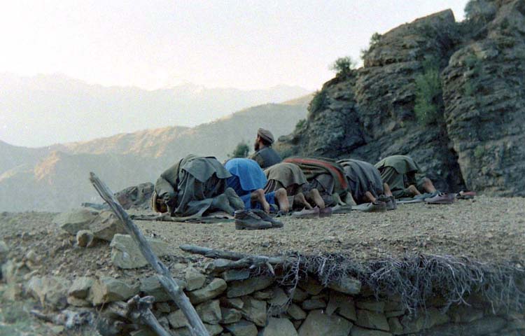 Mujahideen at sunset prayer, Shultan valley, Kunar, 1987